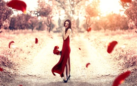 红色的礼服的女孩，玫瑰花瓣，太阳