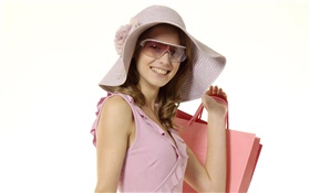 快乐购物的女孩，粉红色的衣服，帽子，太阳镜 高清壁纸