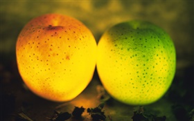 光水果，绿色和橙色苹果